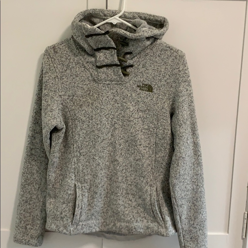 The north face size small hooded fleece jacket